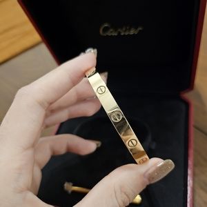 SOLD Cartier love bracelet YG size 17